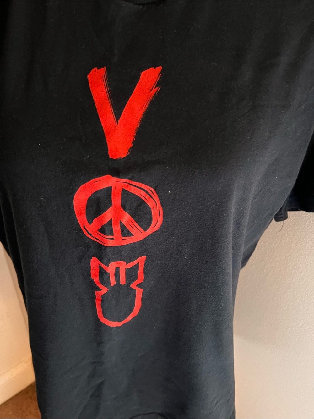 EDUN Black Tee with White Interior Print and Red Accent
